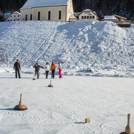 curling on a winter holiday in Tyrol